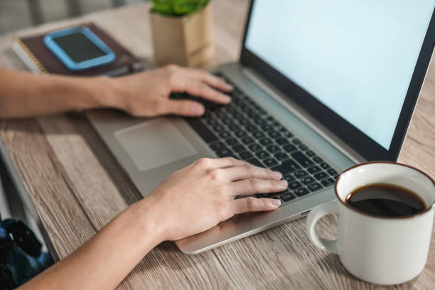 istock Young girl work from home at night time - Digital nomad girl using her laptop computer - Smart working and technology concept - Focus on close-up hand 1219886636