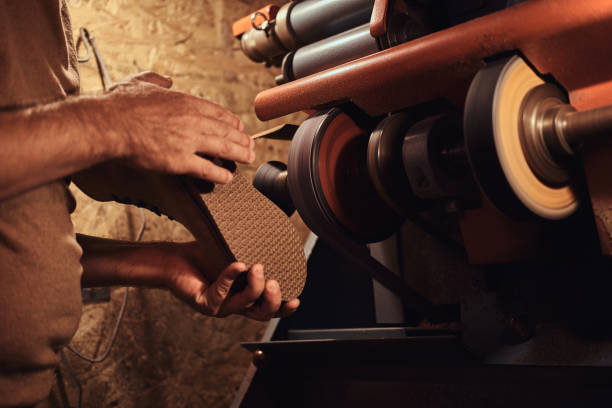 istock Busy man at his own workshop 1219889230