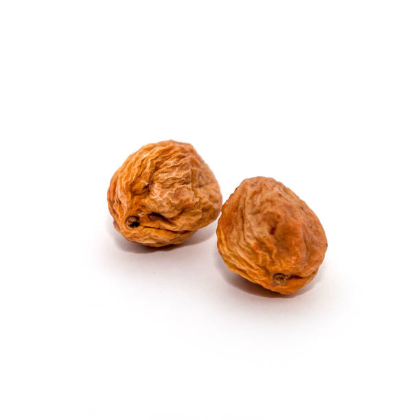 istock red apricot on a white background 1219889766