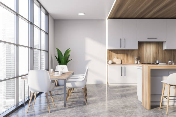 istock White and wooden kitchen with dining table 1219889867