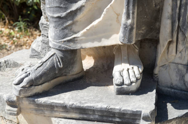 Sandal on stone sculpture in Ancient Corinth Greece, Europe
