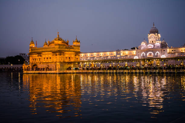 istock Night View of Golden temple Amritsar 1219890419
