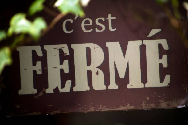 istock Closed sign in french language. 1219891878