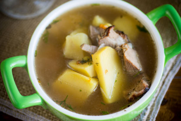 istock hot pea soup with meat and vegetables in a plate 1219893226