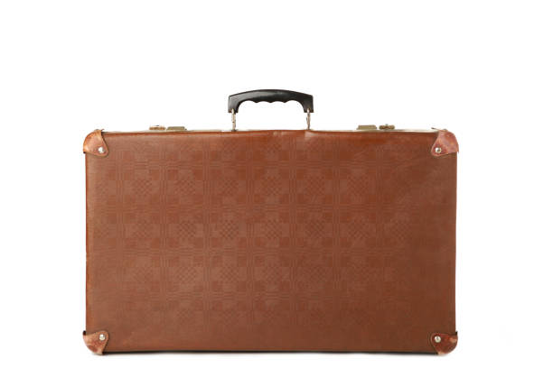 istock Vintage brown suitcase isolated on white background 1219895931