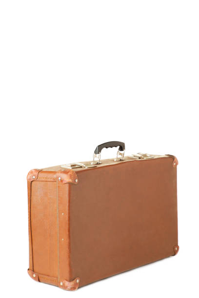 istock Vintage leather suitcase on isolated white background 1219895948