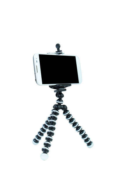 istock Smart Phone with a tripod on isolated white background. 1219896247