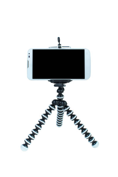 istock Smart Phone with a tripod on isolated white background. 1219896248
