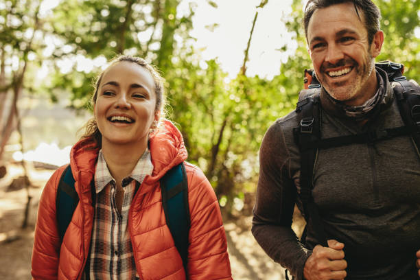 istock Happy couple on a weekend camping trip 1219897278