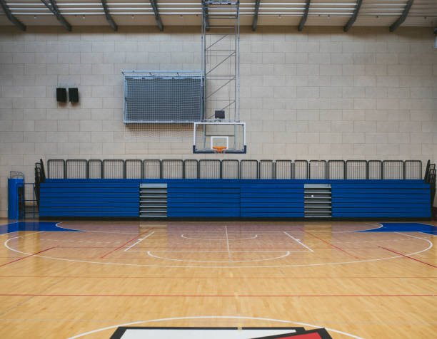 istock Empty School Gymnasium Basketball Court 1219902154