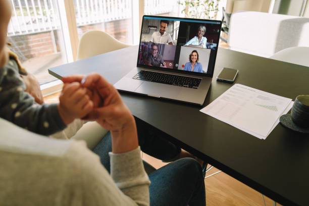 istock Woman working from home having video call with family 1219902446