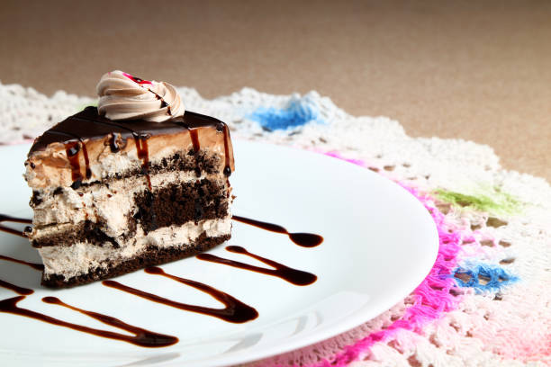 istock Chocolate cake or pastry in a white ceramic plate 1219903211