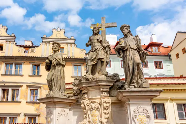 Statues of Saints Cosmas and Damians on Charles bridge in Prague, Czech Republic