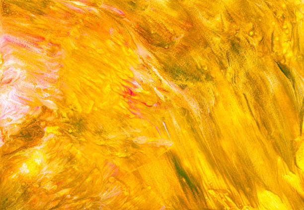 istock paper background dyed by yellow and brown acrylic 1219908340