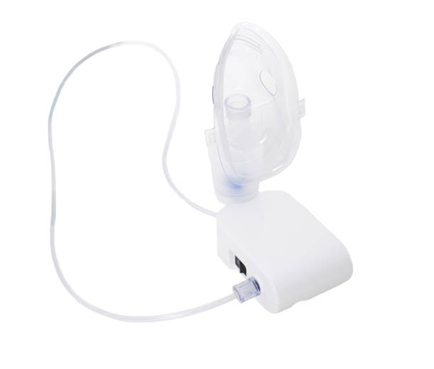istock Modern compressor nebulizer for the treatment of the respiratory tract and bronchi, isolate. Treatment of dry cough and bronchitis 1219910702