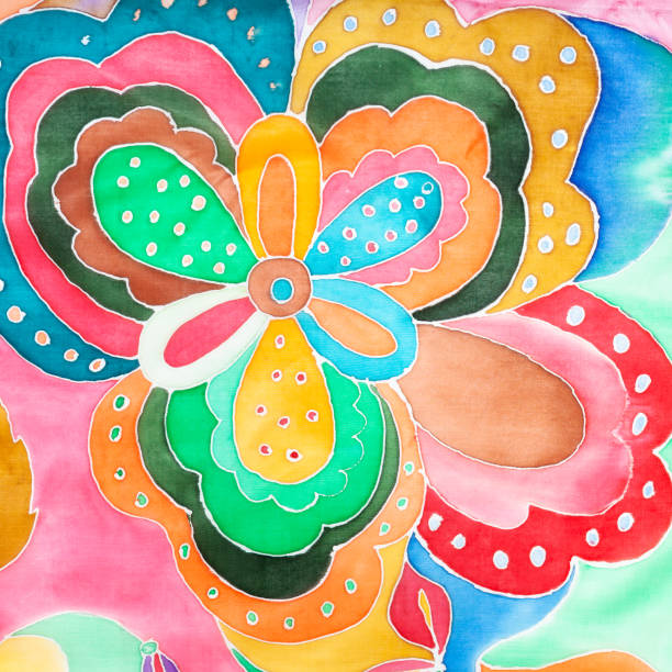 istock flower hand-drawn on silk batik scarf 1219913126