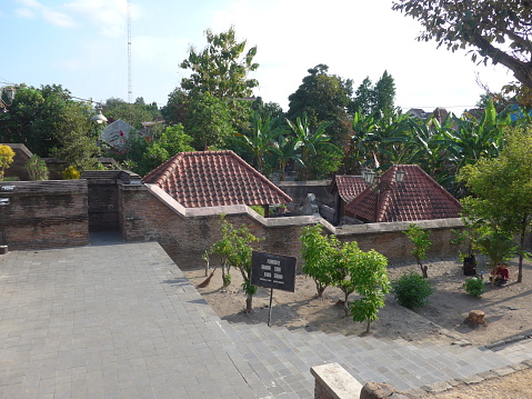 Yogyakarta, Indonesia - September 8, 2019: The Great Mataram Kingdom Mosque at Kotagede, Yogyakarta, Indonesia. Representing the assimilation of Balinese's Hinduism and Islam culture into the religious (Islamic) activities building. The shape of the main gate represented Meru tower, the principal shrine of a Balinese temple