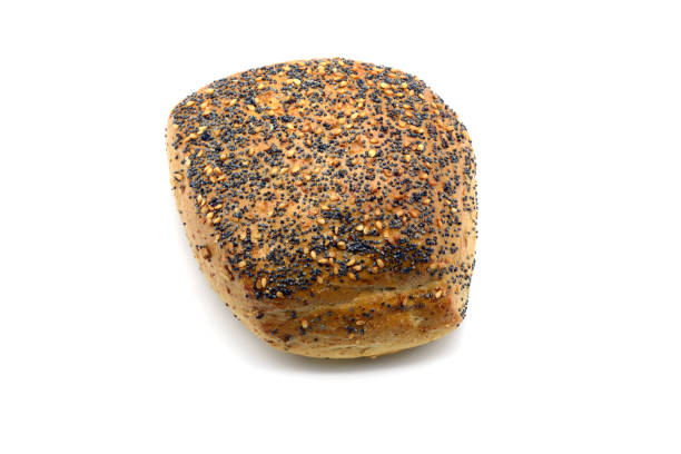 istock Bread roll with poppy seeds and sesame corns on white isolated background 1219916100