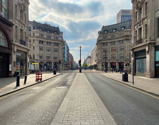 Oxford Street London no people London, United Kingdom - April 18 2020: Empty Oxford Street without people during lockdown covent garden photos stock pictures, royalty-free photos & images
