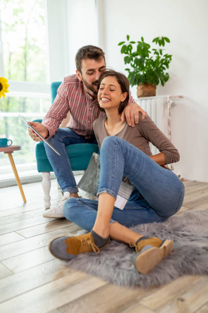 istock Couple having fun at home 1219916392