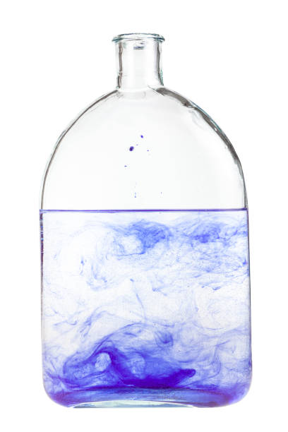 istock red dye dissolves in water in flask isolated 1219919282