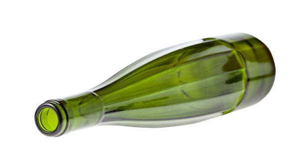 istock lying empty faceted green wine bottle isolated 1219920397