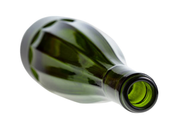 istock overturned faceted green wine bottle isolated 1219920413