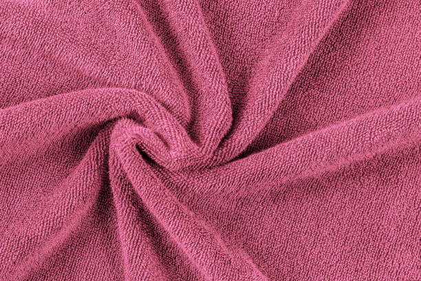 istock Abstract crumpled fabric textile. Delicate soft red terry cloth texture background. 1219920964
