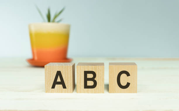 istock Wooden toy Blocks with the text: abc 1219923579