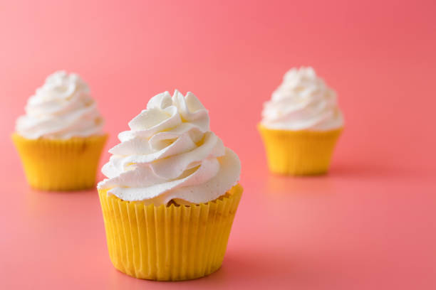 istock Homemade Birthday cupcake on pink Background. 1219925003