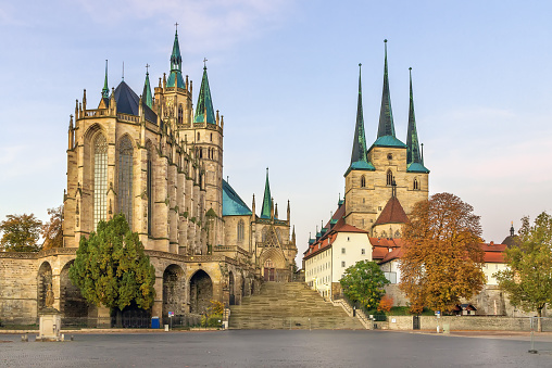 Erfurt Cathedral and Severikirche church, Germany. Both churches tower above the town scape and are accessible via huge open stairs called Domstufen.