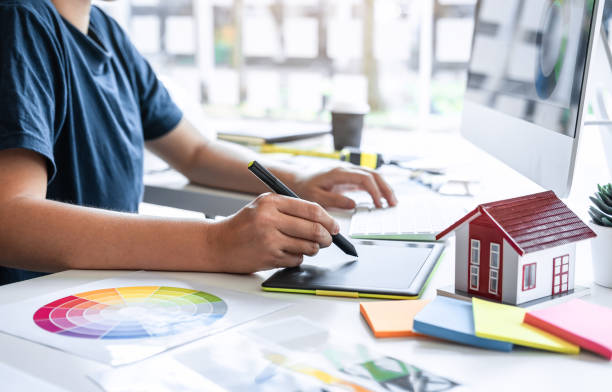 istock Young Interior graphic designer working project sketching on graphic tablet working at modern office, creative inspiration and imagine 1219925469