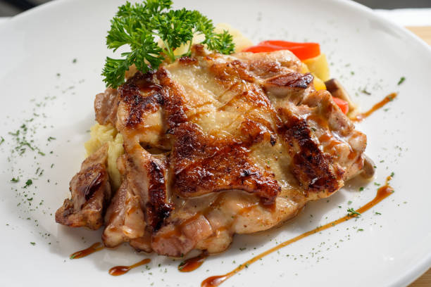 istock Grilled chicken chop with mix vegetables 1219925701