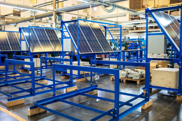 Interior of a fabrication and machining factory Interior of a industrial warehouse with fabricated stands on shop floor. Fabrication and machining factory. solar panel manufacturing stock pictures, royalty-free photos & images