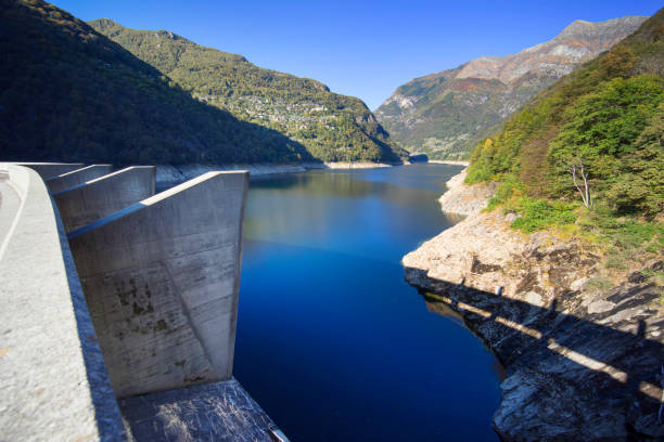 Dam “Verzaska” - hydroelectric power station Dam “Verzaska” - hydroelectric power station on Lake Vogorno in Switzerland, where the famous film about agent 007 James Bond was shot. You can repeat his famous jump vogorno stock pictures, royalty-free photos & images