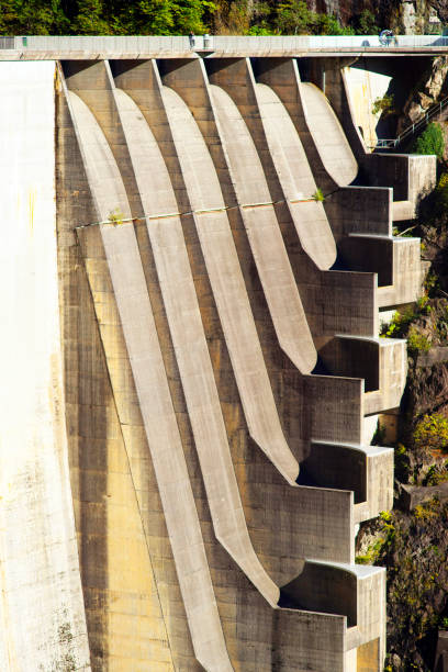 Dam “Verzaska” - hydroelectric power station Dam “Verzaska” - hydroelectric power station on Lake Vogorno in Switzerland, where the famous film about agent 007 James Bond was shot. You can repeat his famous jump vogorno stock pictures, royalty-free photos & images