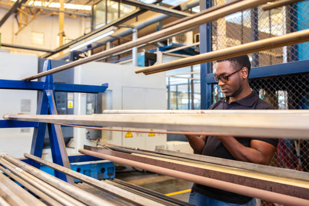 istock Worker inspecting the raw material in factory 1219929349