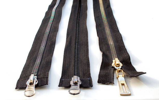 istock three metal closed zippers closeup 1219932521