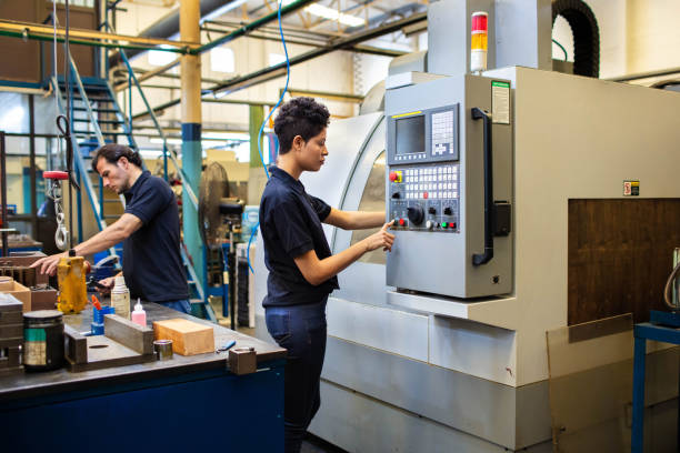 istock Employees working in manufacturing factory 1219932556