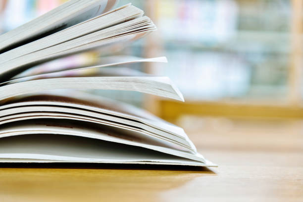 istock Open book on the desk of library 1219934261