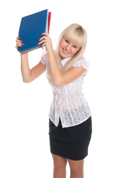 istock Cheerful young woman with business folders. 1219935459