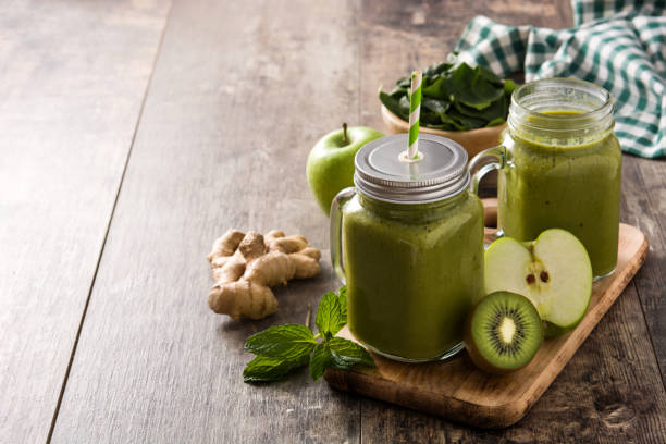 istock Healthy green smoothie in jar 1219935674