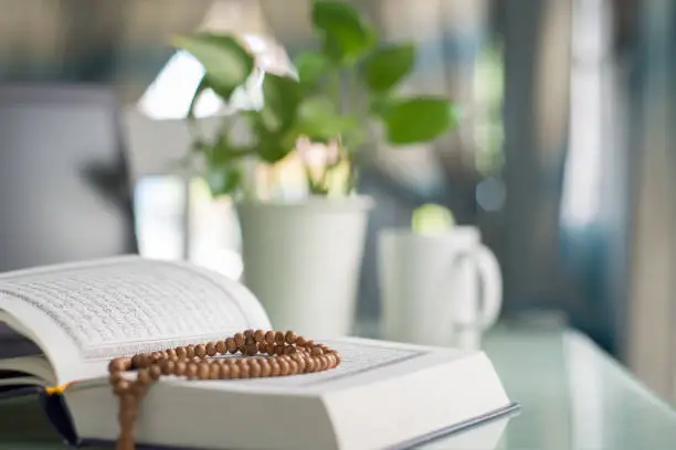 Koran and beads on the table during Ramadan