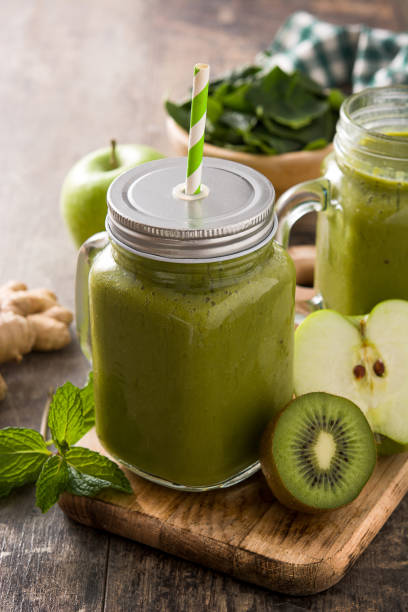 istock Healthy green smoothie in jar 1219936521