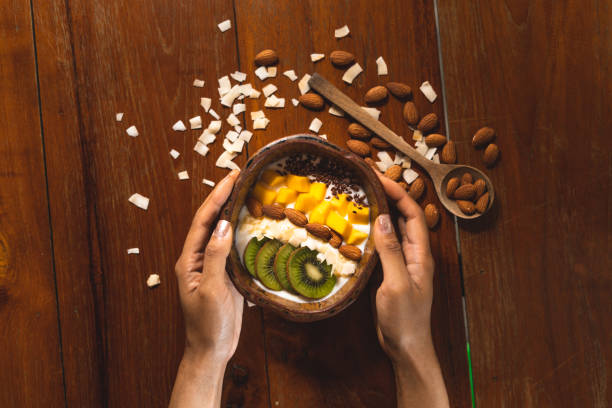istock Yoghurt, mixed fruit and cereal In a wooden cup 1219938635