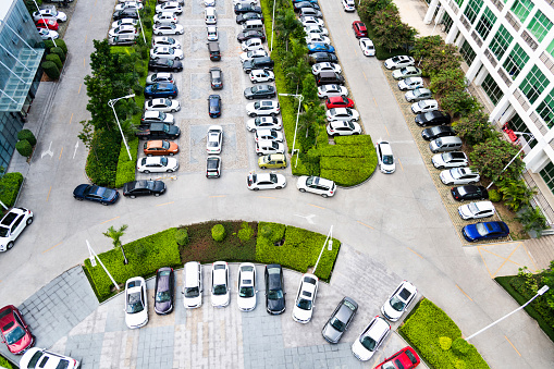 High angle view of parking lot in residential district.