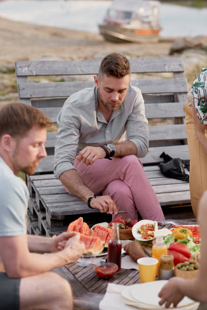 istock Friends Eating Outdoors 1219940788