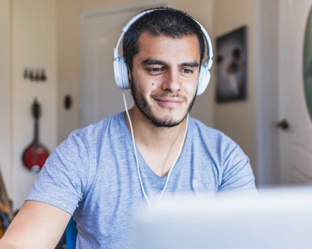 istock Men listening music with technology 1219940934
