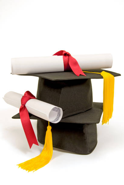 istock Graduation For Two With Diplomas 121994098