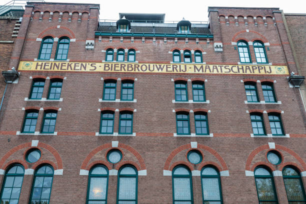 Amsterdam, Netherlands - September 8, 2018: Facade of Heineken brewery headquarters or Heineken Experience in the centre of Amsterdam, Netherlands